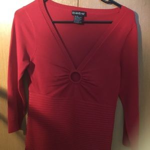 SOLD...Bebe sweater size Med.